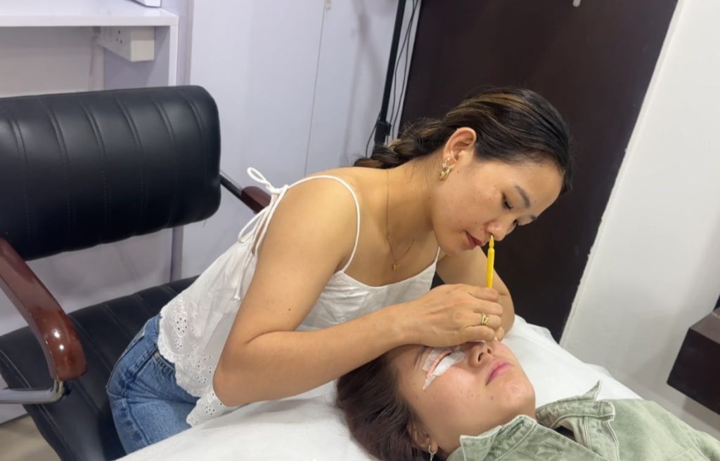 Reshmi providing service on a client